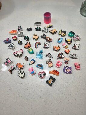 Crocs Button And A Pink Slinkey